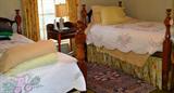 Pair of antique twin maple beds