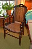 Victorian caned seat and back armchair