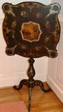 STUNNING - one of my favorites - High style Victorian Paper Mache tilt top table with MOP inlay and hand painted central design.
