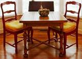 2 of 4 red painted French style ladderbacks and oak draw pub table