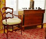 French style ladderback armchair, Regency style commode, decorative monkey lamp and bound floral carpet