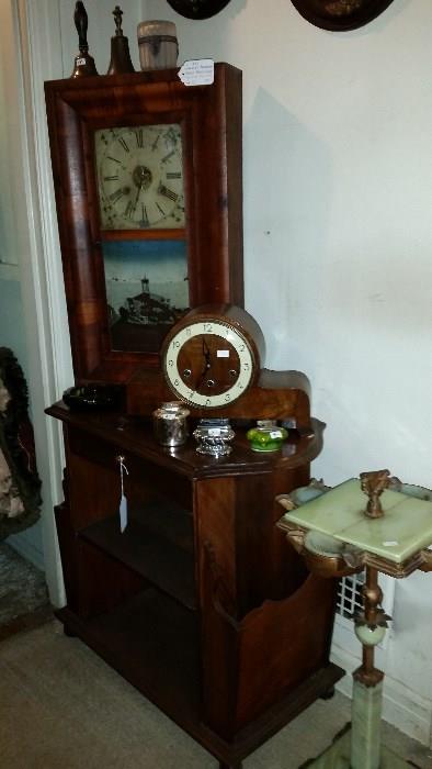 Antique clocks, smoking stand