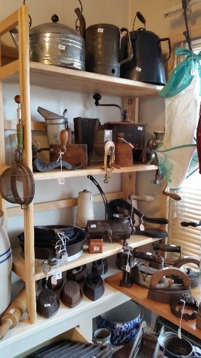 Tons & tons of antique and vintage kitchen with lots of cast iron.