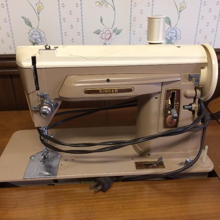 #16 Singer Sewing Machine in Cabinet $75 — in 