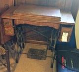 #24 Sewing machine Tredle in Cabinet $150 — in Huntsville, Alabama.