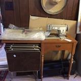 #16 Singer 237 sewing machine in cabinet $75 