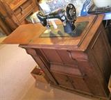 #25 Singer sewing machine in old oak cabinet $100 