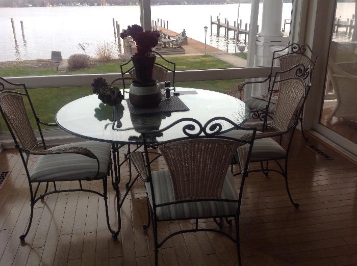 Wicker and glass casual dining set