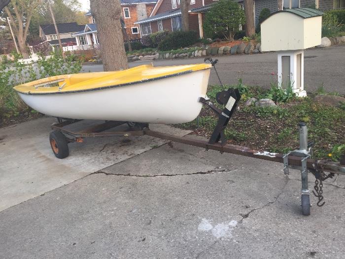 THIS ITEM AVAILABLE FOR PRE-SALE.                    The sailboat is a 1987 FJ (Flying Junior).  It is older and has been patched up but works great and includes: Main Sail, Jibs, Spinnaker, Rudder, Tiller, all the required rigging lines.  Completely rigged sailboat and trailer and ready to sail.  