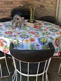 Round patio table with 5 chairs