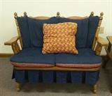 maple settee with cushions