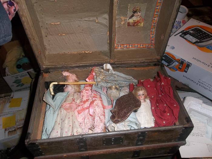 This is a smaller doll trunk and its full