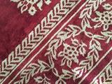 a closer detail of patterning on rug