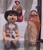 Left: Storyteller Leonard Tsosie  Right: Pottery Maxine Toya