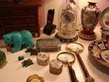 Large turquoise bear and assorted decorative items.