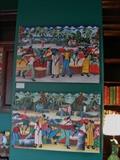 Two very colorful Haitian paintings