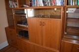 Large teak entertainment system; to be sold in separate components. Purchased approximately 32 years ago from Scandinavian Design.