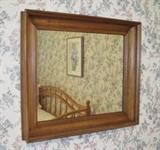 Antique walnut ogee style mirror