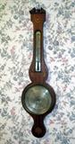 Antique early 19th century mahogany English wheel barometer by G. (Gillando) Broggi, with shell and flower inlay. The finial is missing and there is damage to the top crest.