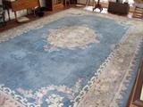Huge 11" x 18" rug, hand woven in India, 100% wool. The rug is in need of cleaning but has a lovely vintage look. 