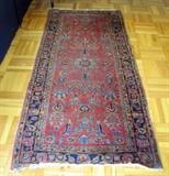 Oriental rug in need of restoration.