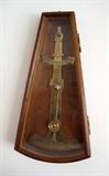 Brass nautical inclinometer (tilt meter) in wooden case, used to measure degrees of pitch