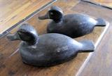Pair of hand carved bluebill duck decoys by Hector Stewart of Brockville (probably Ontario), dated 1956