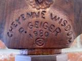 Signature on Pershing Geiger wood carving