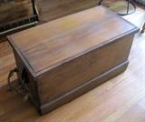 Antique sea chest with rope handles