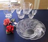 Fine glassware, including Waterford, Baccarat, and Heisey, and two Capodimonte porcelain roses