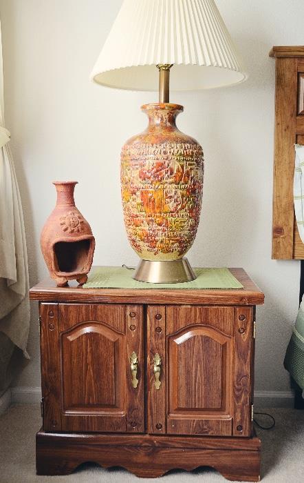 Side Cabinet with Lamp and Pottery