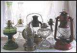 Kerosene and electric lamps. One is a Dietz Little Wizard