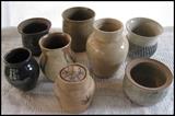 Smaller hand-crafted stoneware pots.