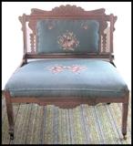 Victorian beautifully carved settee with needle point floral design