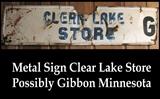 Could this be from Gibbon Minnesota? Metal store sign says "Clear Lake Store." Missing the other that begins with a "g." 