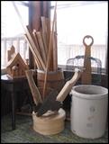 Yardsticks, birdhouse, tools, bird cage, red wing crock