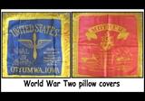 Two World War 2 pillow covers. One is from the Naval Air Station in Ottumwa, Iowa