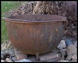 Huge cast iron cauldron