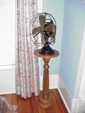 Antique fan; turned wood pedestal