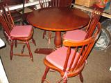 Cherry Duckloe dining set. Sold as a set, table and four chairs.