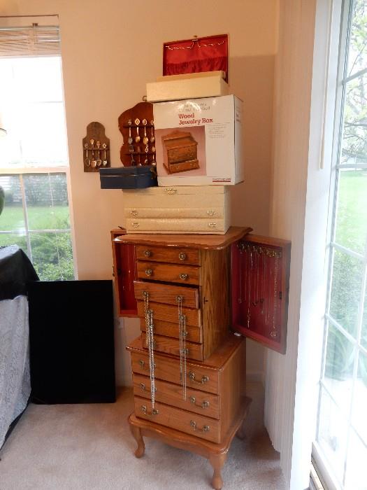 jewelry case on legs and vintage boxes on top