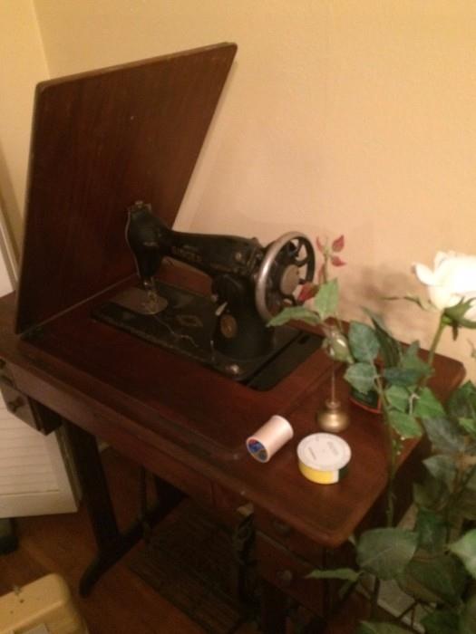 one of three sewing machines
