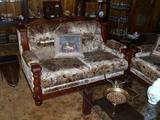 We have the loveseat, sofa and chair with ottoman.  Oak trim.