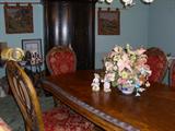 Dining room table and 6 carved chairs