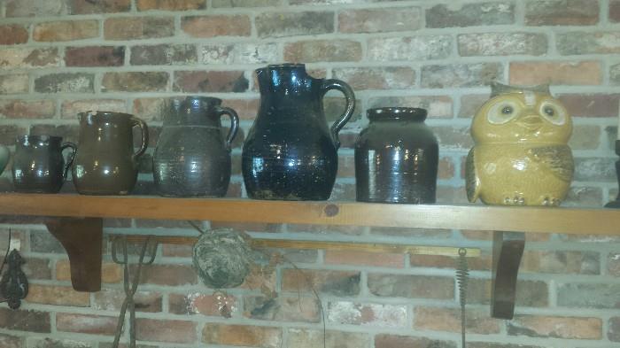 Southern pottery pitchers and jugs. McCoy owl cookie jar. 
