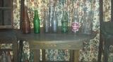 Small round primitive table, Rare bottles including Coca Cola straight sided (Conyers, GA); Shamrock Ginger Ale by Coca Cola Bottling Co - Eastman, GA; Red Rock Cola - Hawkinsville, GA; Grapette Soda elephant, and more! 