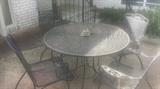 Wrought iron patio set (6 chairs).