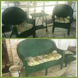 Green wicker set including sofa, chairs, coffee table, and end table. Pottery flower pot & wrought iron stand (along with several other wrought iron plant stands not pictured). 