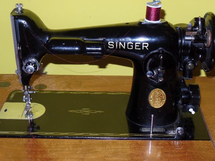 Vintage Singer sewing machine with table