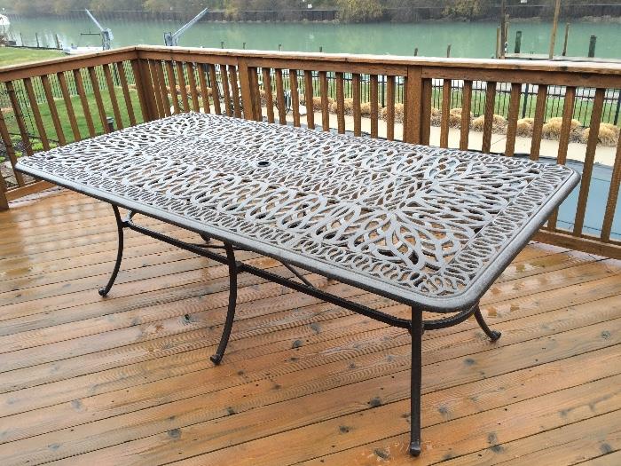 Wrought Iron Outdoor Table w/ 6 Chairs (2 Rockers and 4 arm) 